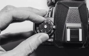 closeup of an exposure compensation dial on a dslr camera.