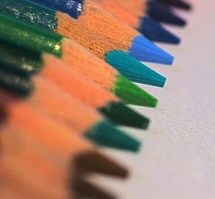 blurred image of colored pencils.