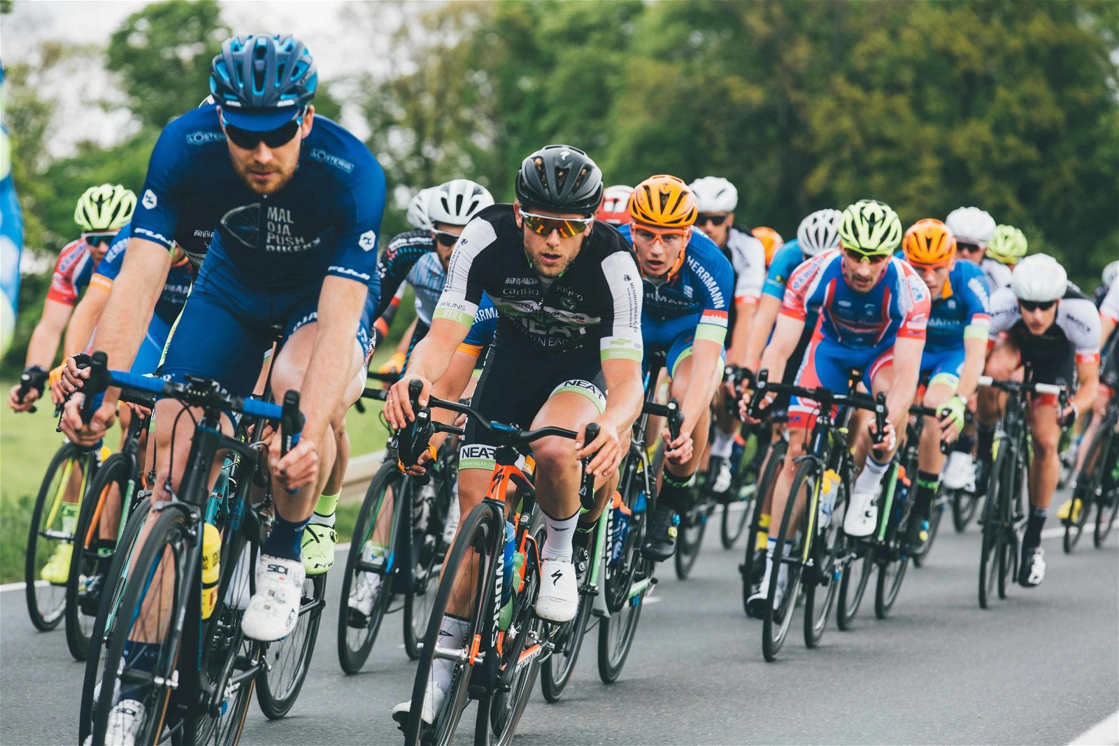 Knowing the sport you want to photograph can help you position yourself to get the images you envision, such as this photograph of a bicycle race.