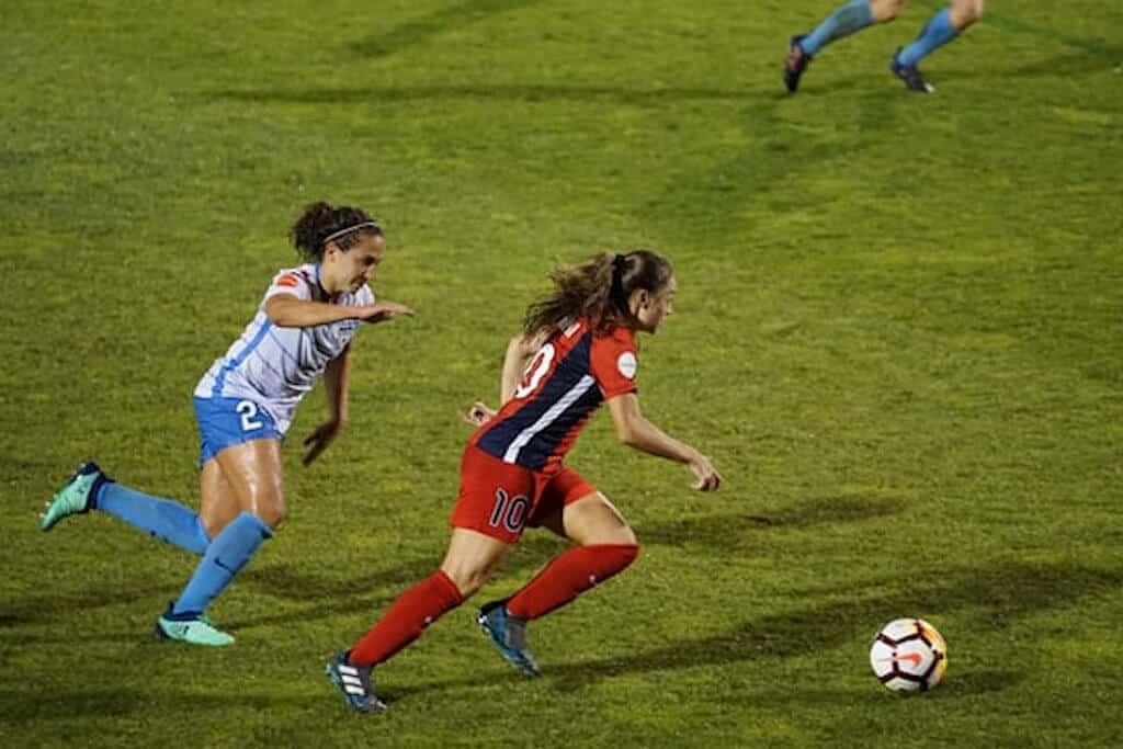 When shooting outdoors, fast, zoom lenses are a must to freeze that action, as seen in this image of soccer players.