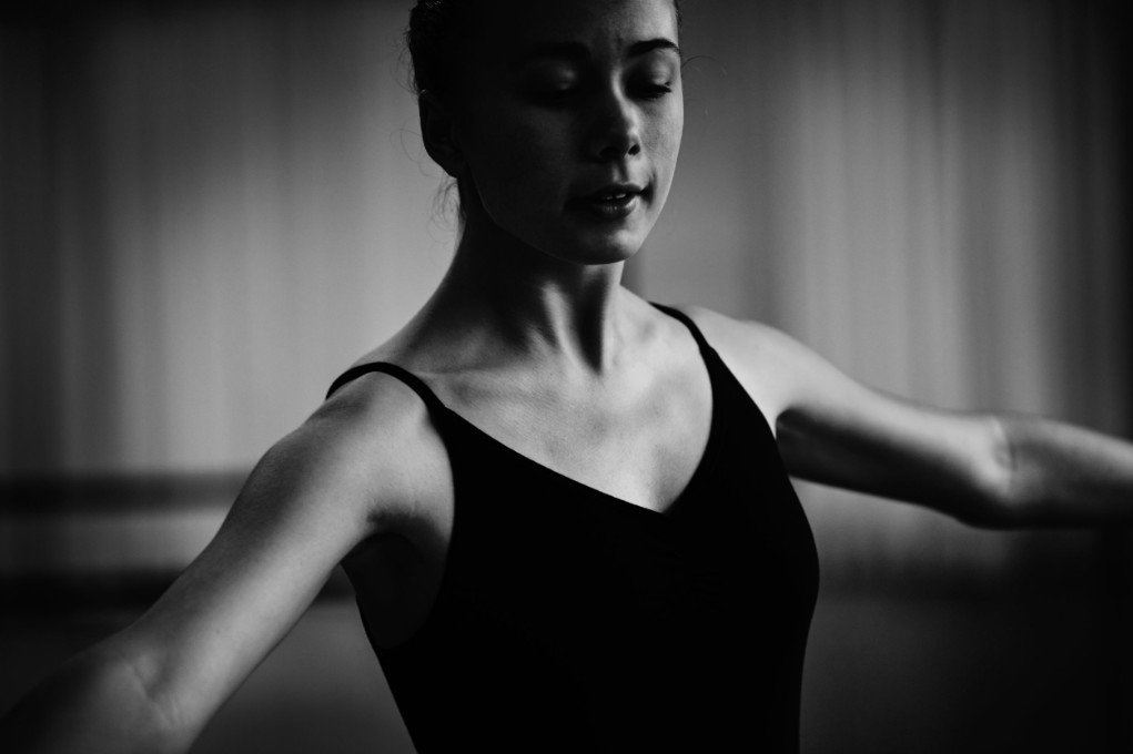 Young woman practicing her ballet dancing.