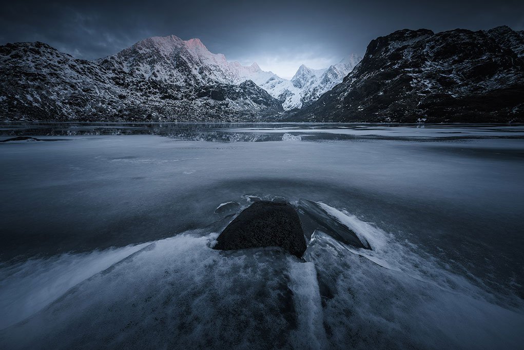 frozen lake and mountains