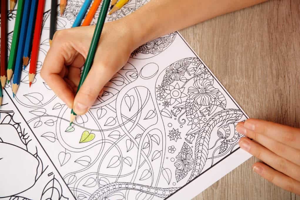 coloring book with hands close up.