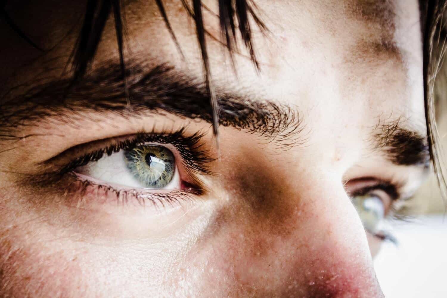Cropped images can result in stunning male model images, like this closeup of the model's eyes.