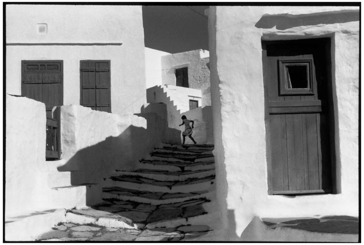 photo of a running child by Henri Cartier-Bresson.