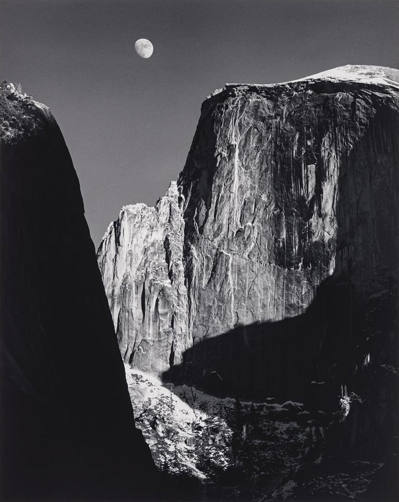 Photo by Ansel Adams of the moon and half dome in Yosemite National Park.