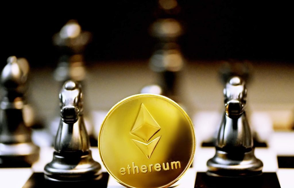 close-up of ethereum token on a chess board.