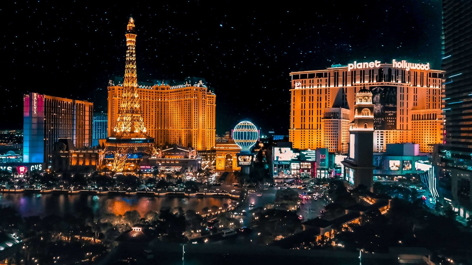 Neon lights, such as those on the Las Vegas strip seen here, are another light source.