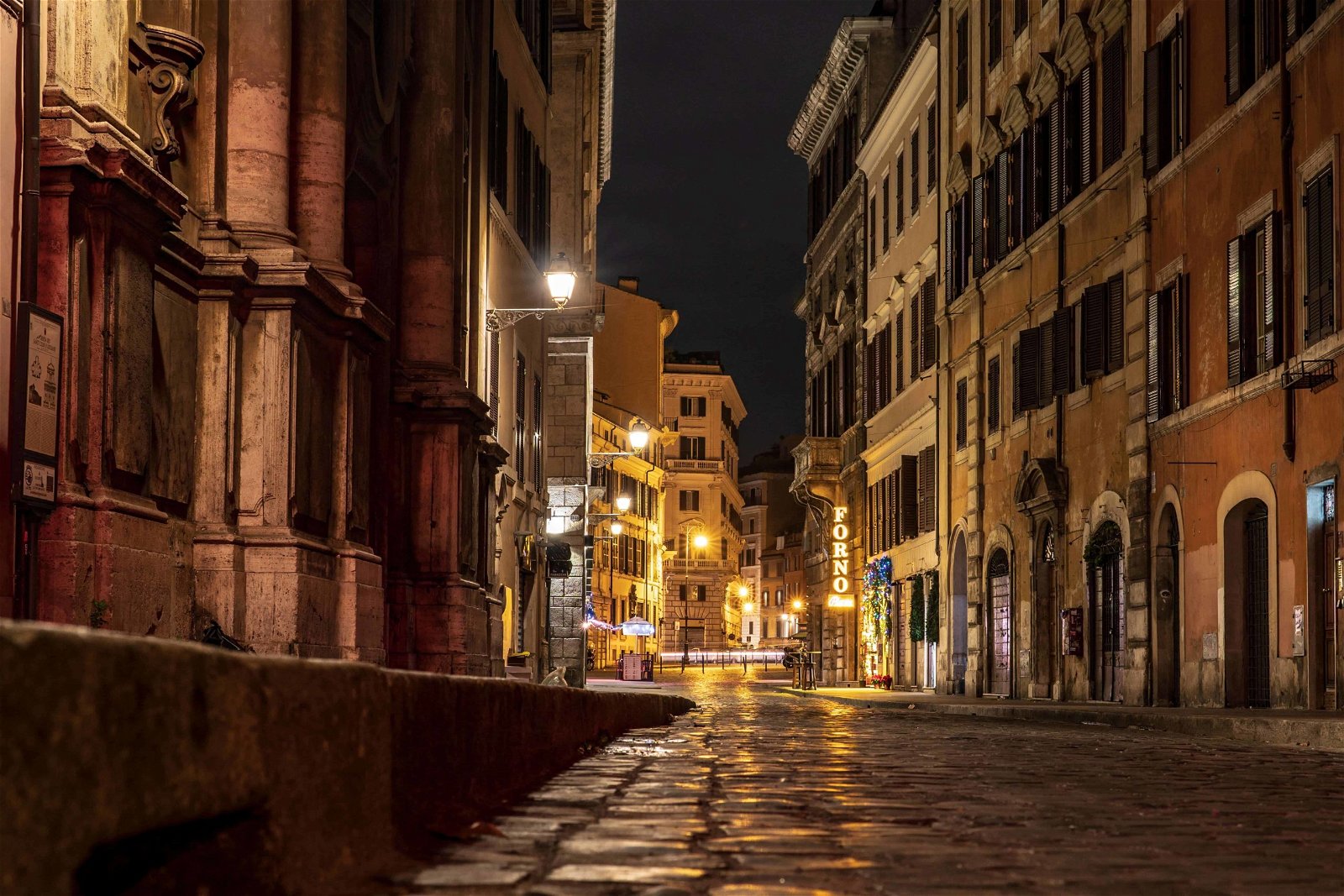 Sometimes deserted streets at night, such as those seen here, tell a compelling stories.