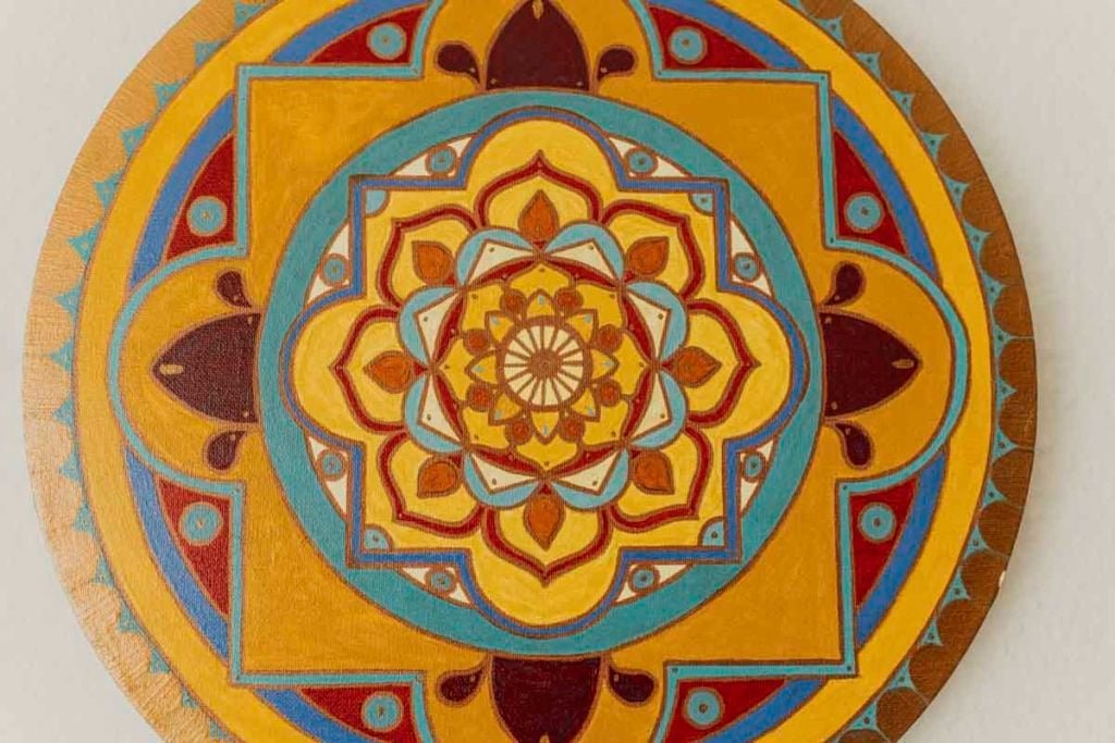 The mandala shape as radial balance.