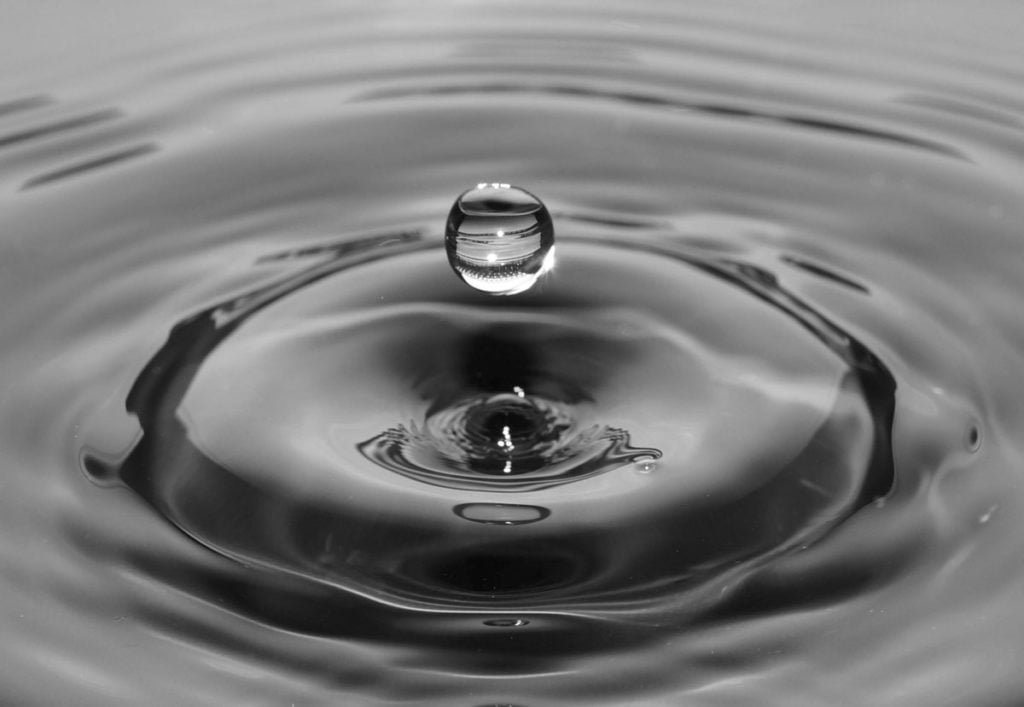Water droplet in a pool can create radial balance.