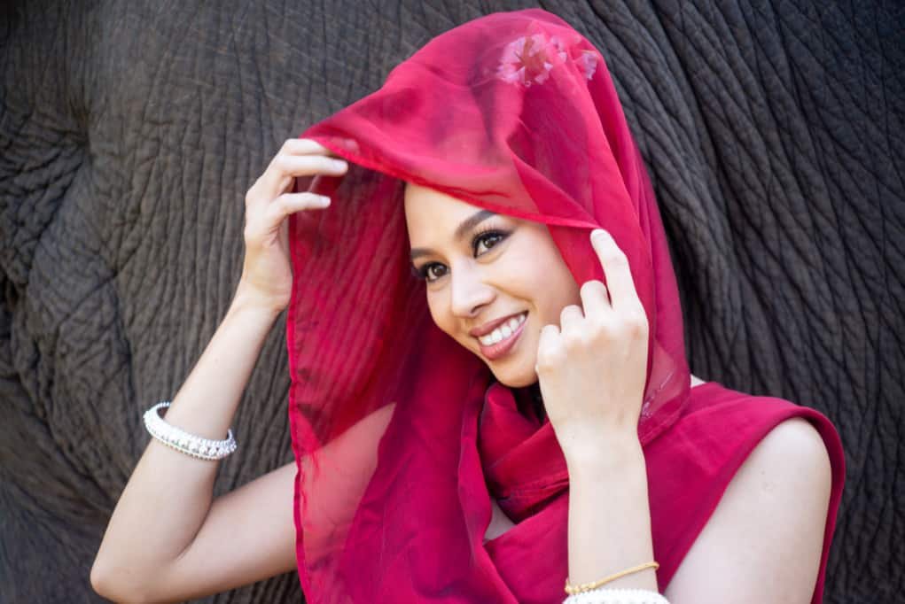 Thai model with scarf for shooting in manual mode.