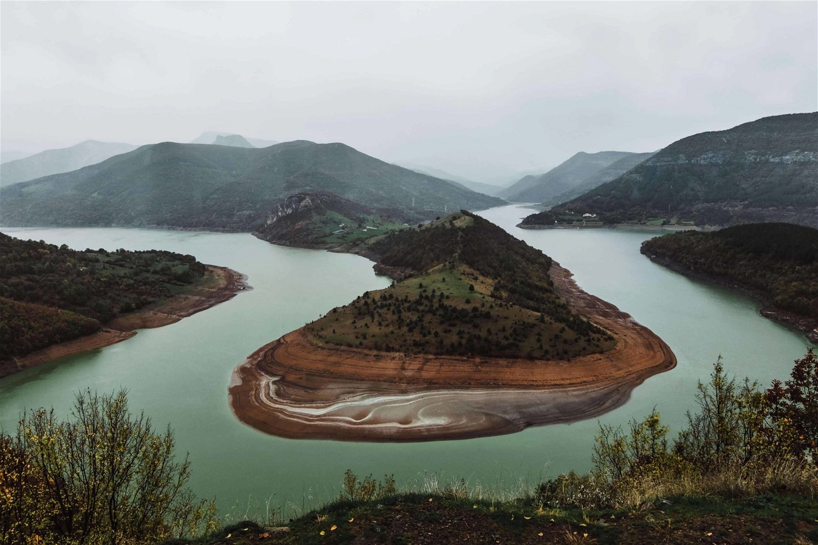 Don't be intimidated by inclement weather. You can get great travel photography shots even on cloudy days, as seen in this landscape photo.