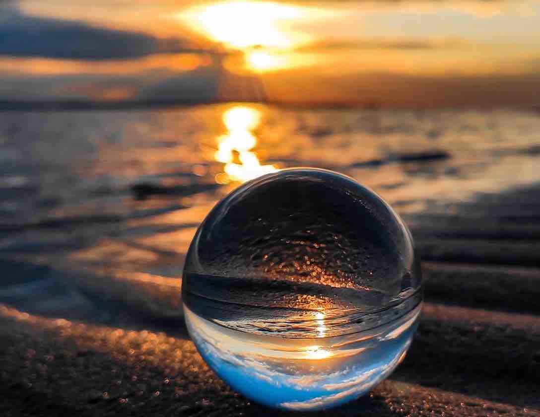 beach sunset crystal ball.