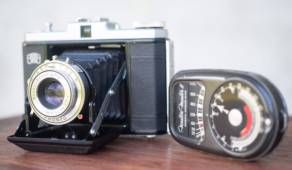 Old camera and incident light meter for article on the zone system
