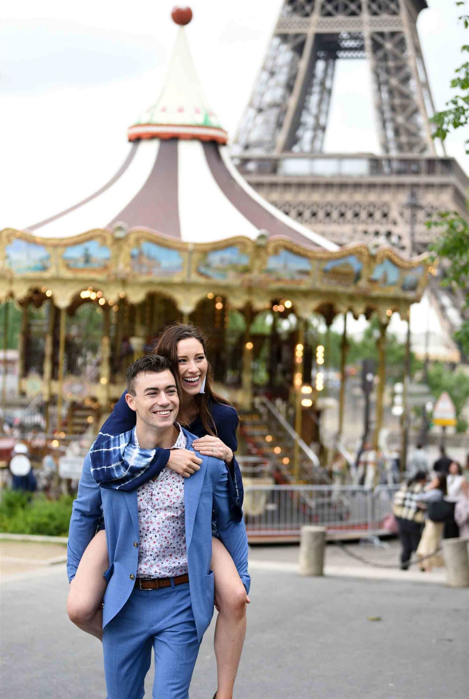 photo of a couple at the carousel.