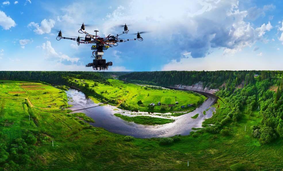 image of a drone over a river.