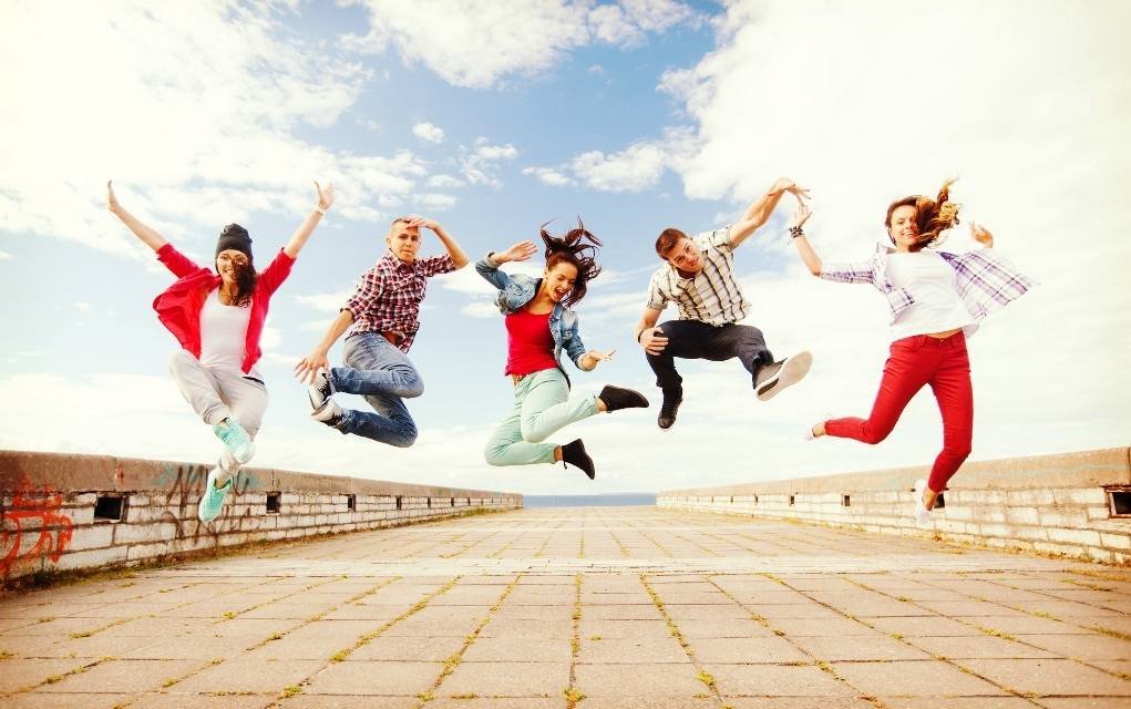 group jumping pose.