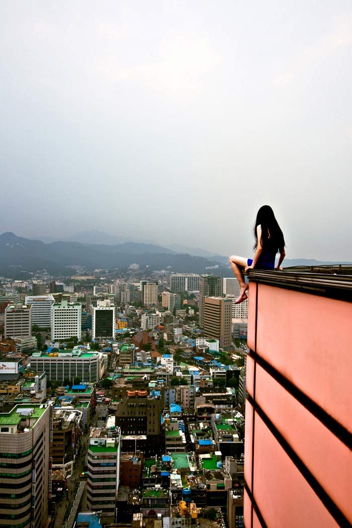 Jun Ahn on a skyscraper