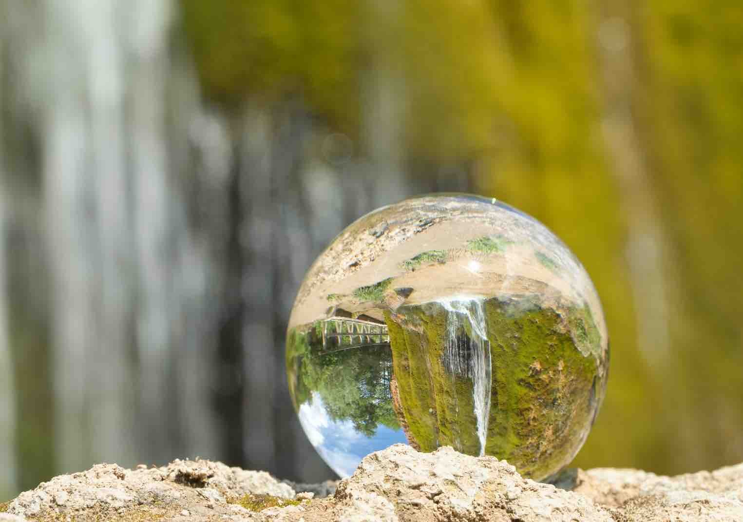 lensball with waterfall background.