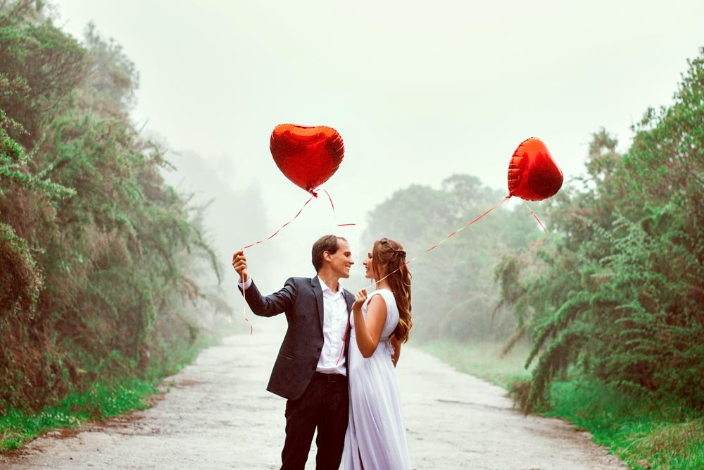 Environmental portraits for valentine's day photo session with props.