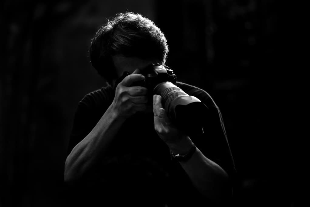 photographer in the dark.