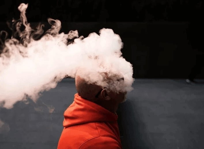 portrait of a man with smoke.