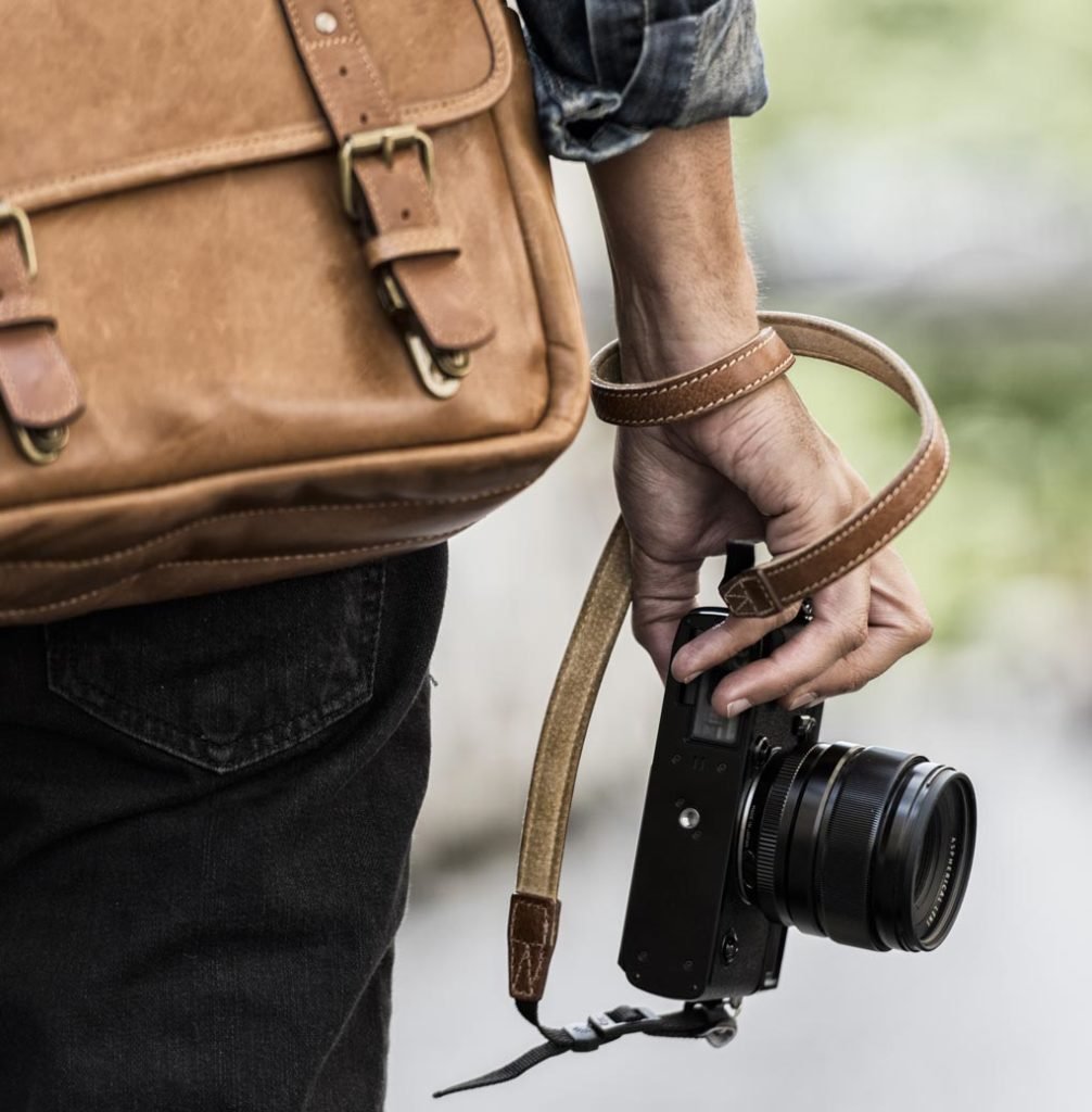 photographer holding a camera.