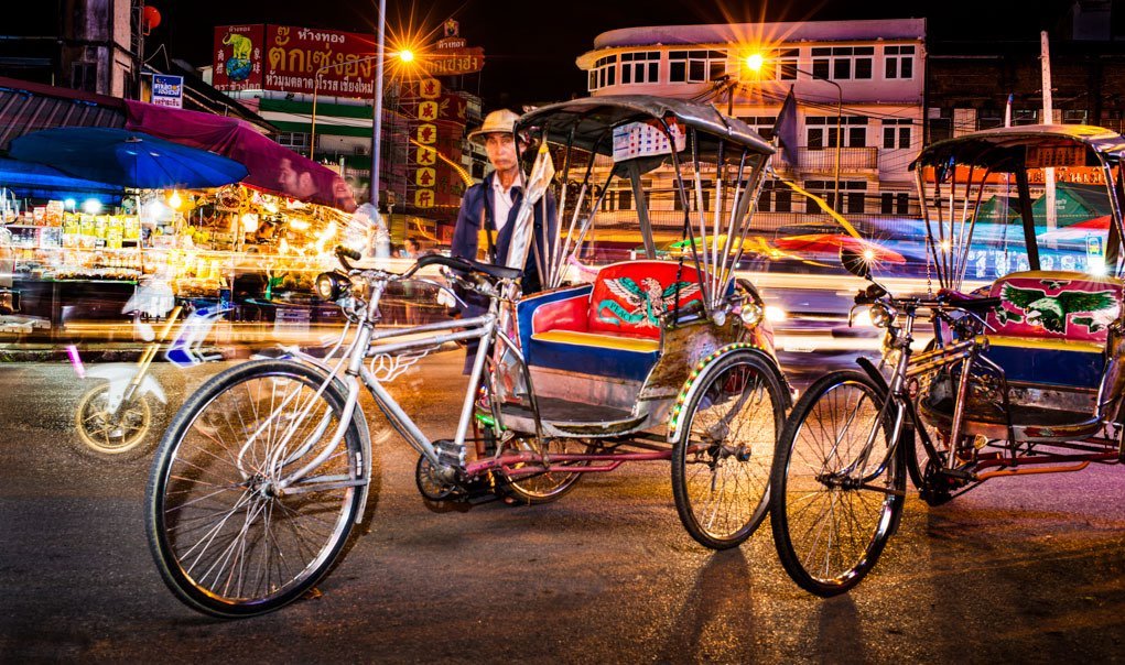 Warorot Market at night with a samlor street rider