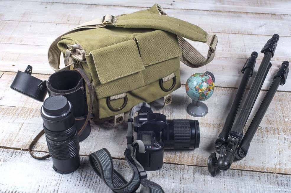 bag, camera, lenses, and tripod for photographing waterfalls.