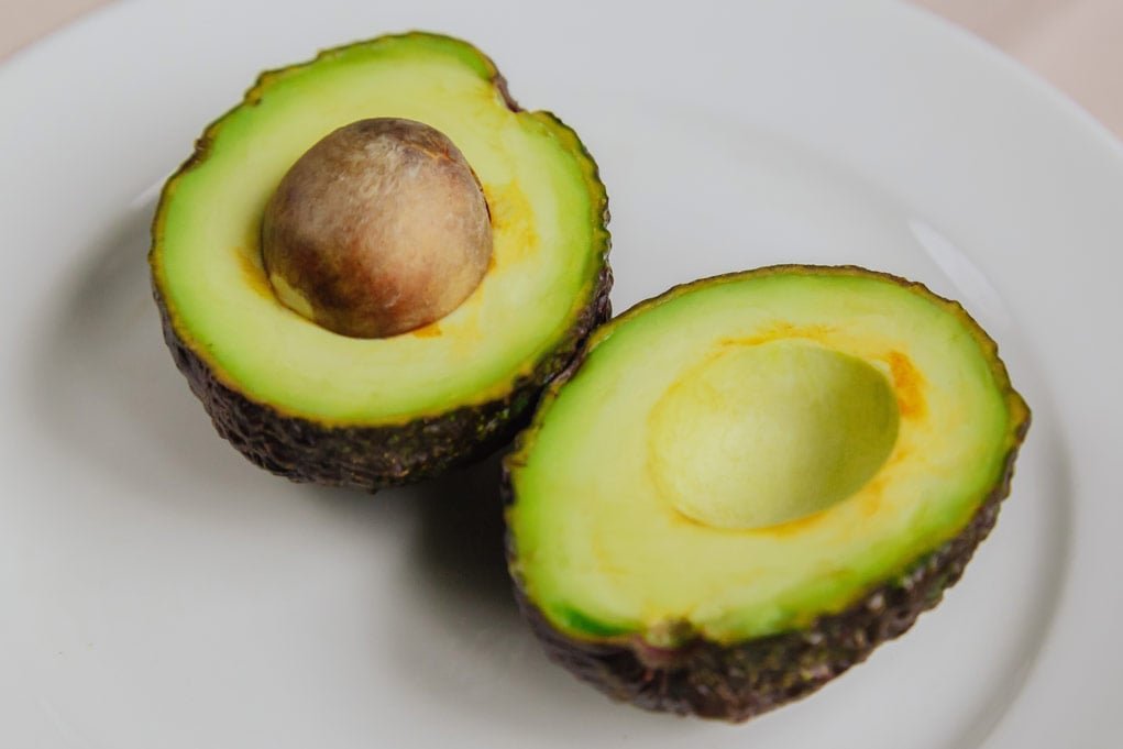 avocado in a white plate.