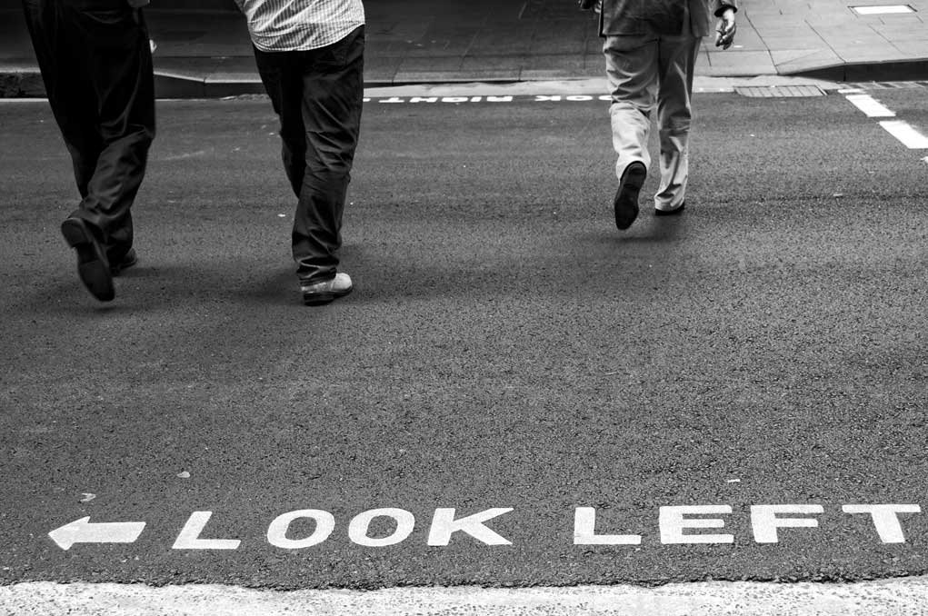 Look left sign in the street.