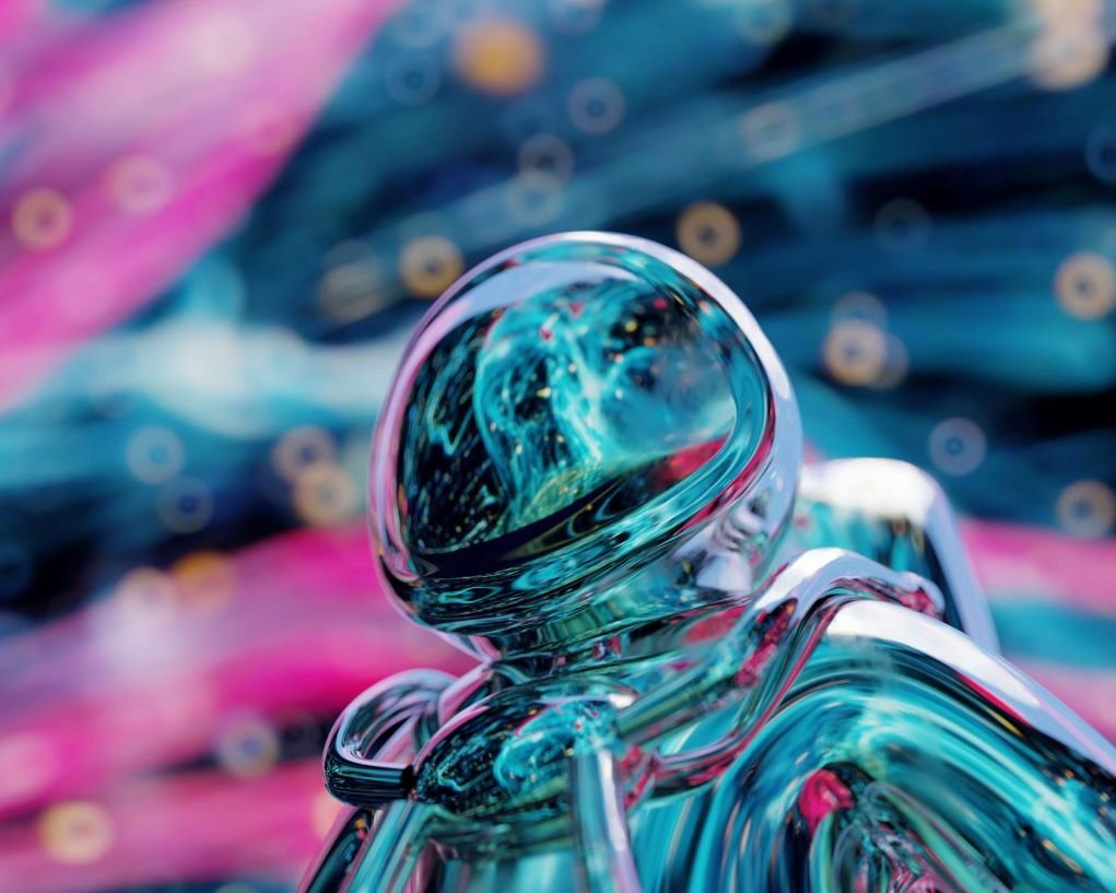 macro photography of silver metallic toy astronaut.