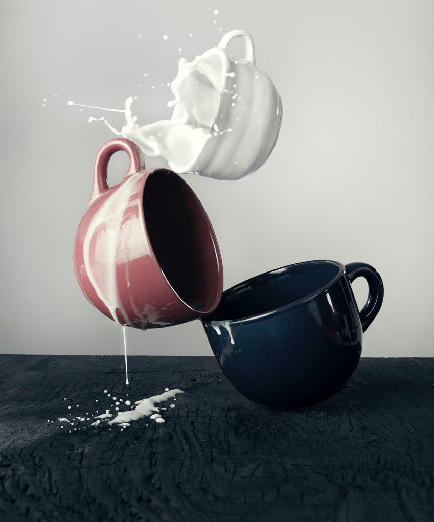 coffee cups colliding for extraordinary photography.