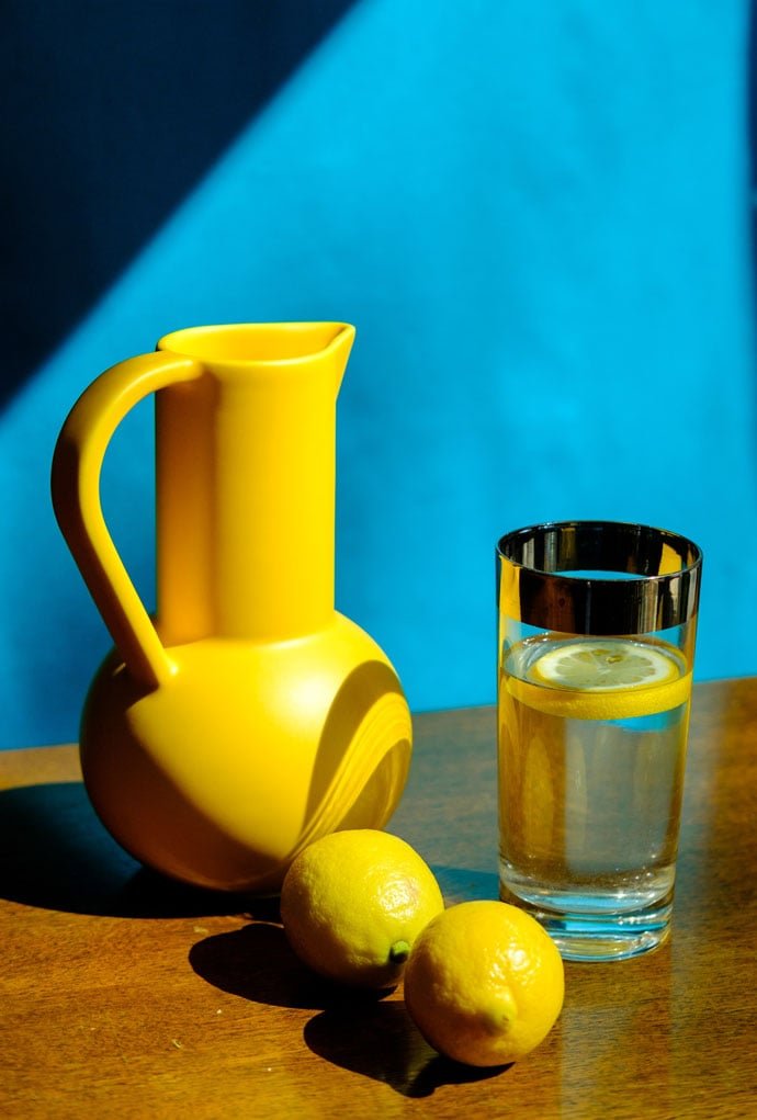 lemons and yellow jug.