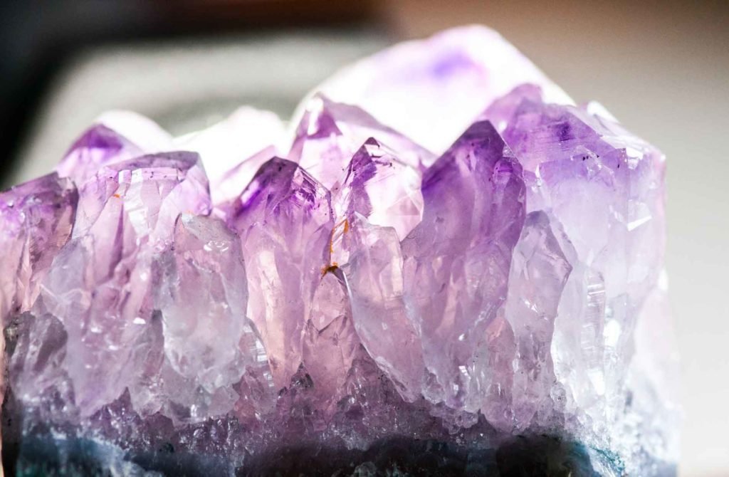 purple amethyst mineral close up.
