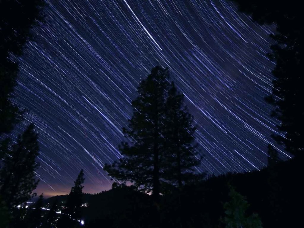 stars streaking in a night sky time lapse.